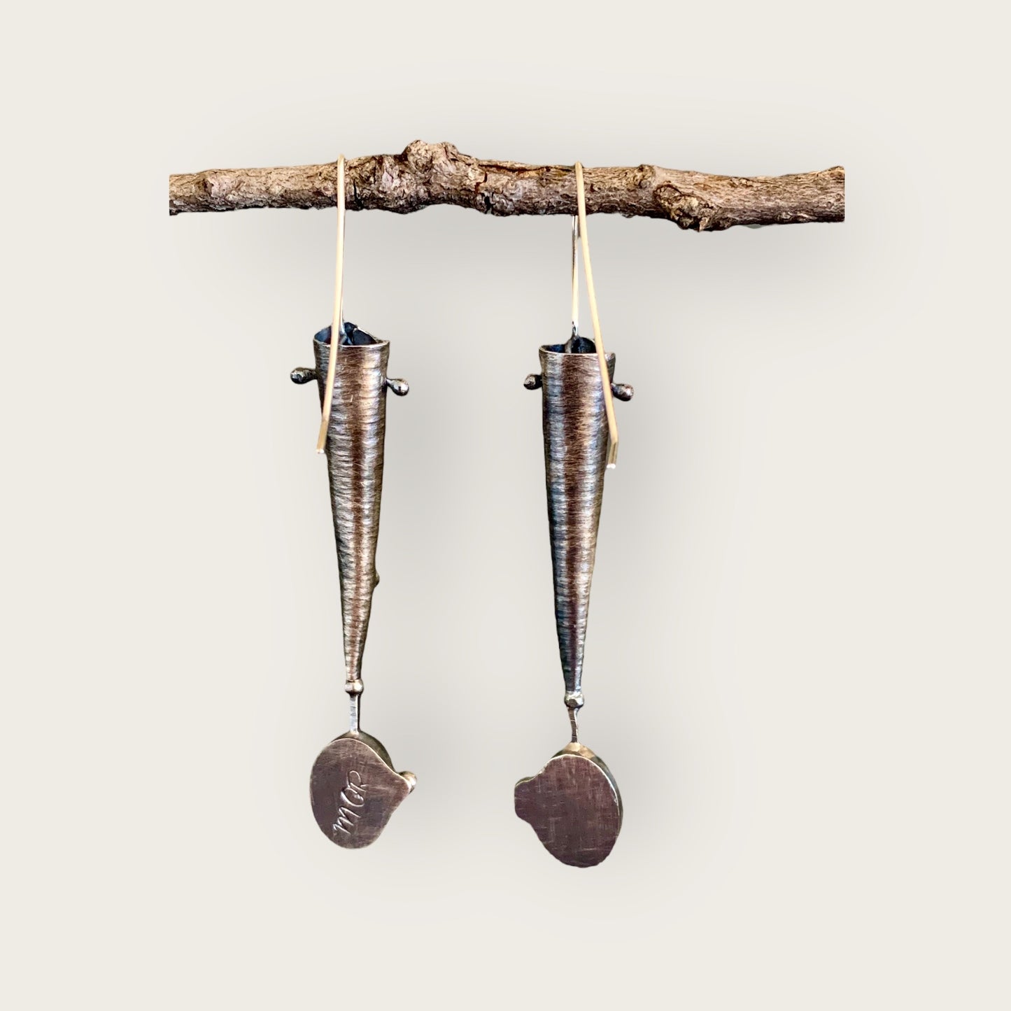 “Buttoned Up” sterling silver sculptural earrings