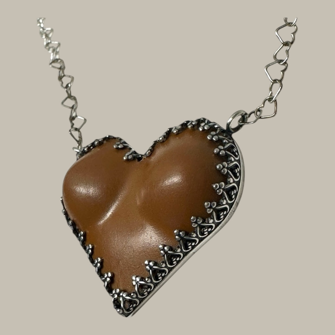 Brown Breasted Heart Throb Necklace