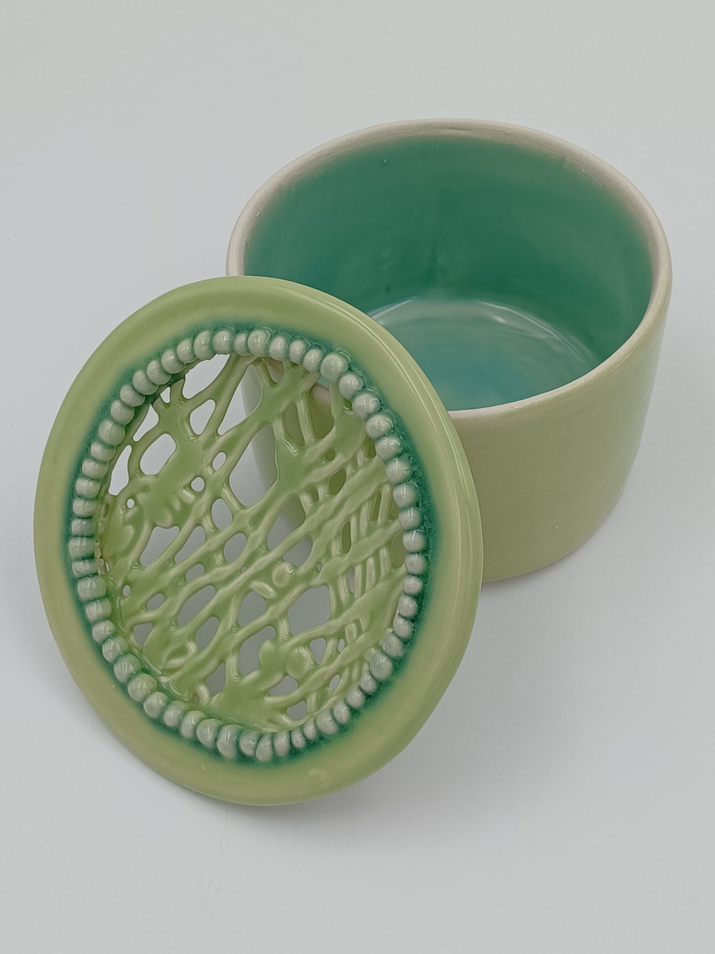 Round Green Covered Jar With Lattice Lid