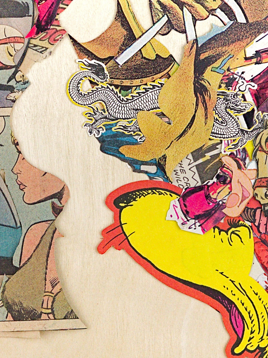 A closeup in the middle of the work with tangled chaos on either side of an undulating negative space.