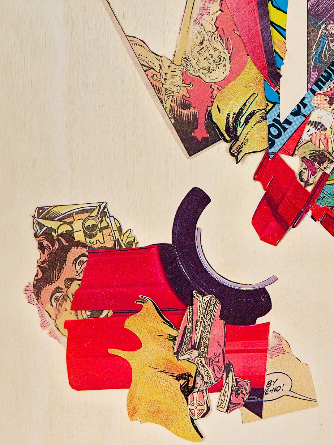 A detail crop of the lower left, showing a frightened, up-lit mans' face peeking from behind the car segment, and a golden cyborg warrior looming behind him. There is also a swath of yellow fabric and the red-and-gold bishop on top of the car piece. At the top of the frame, an upside-down comic panel depicts an ancient man holding up a golden sword that radiates light.