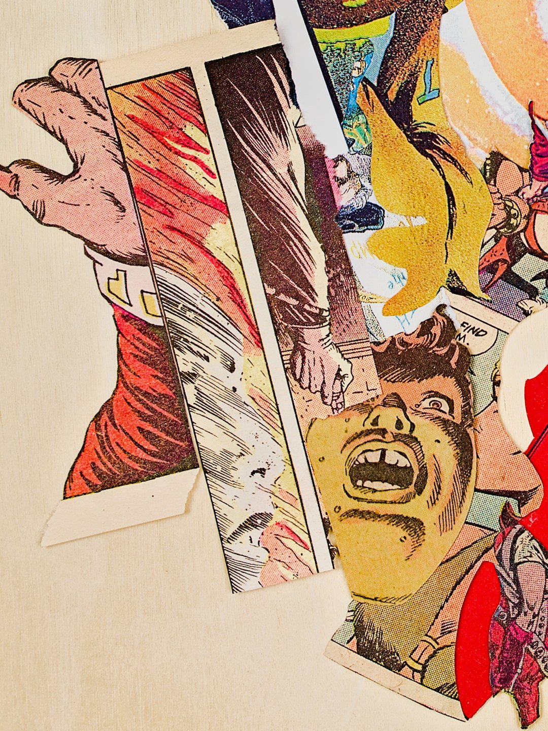 A detail from the lower-left side, showing a grasping, red-clad arm and two narrow comic book panels forming a strong set of diagonal lines. The middle of that set shows a face being immolated, the directional lines of the blast of fire mirroring the shading of the sleeves to each side of it. Peeking out to its right is a horrified face, up-lit by yellow-orange light. The pieces surrounding these to the right and above are too abstract and tangled to identify.