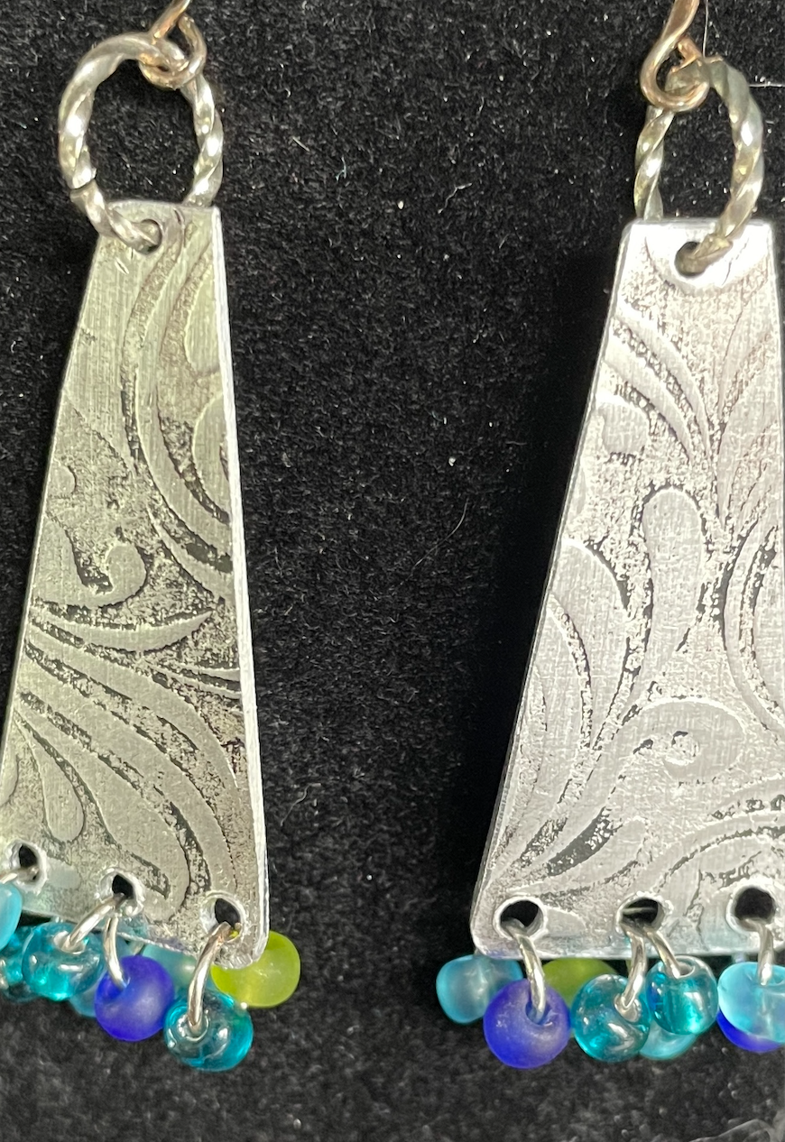 Patterned Aluminum Earrings with Beaded Fringed End